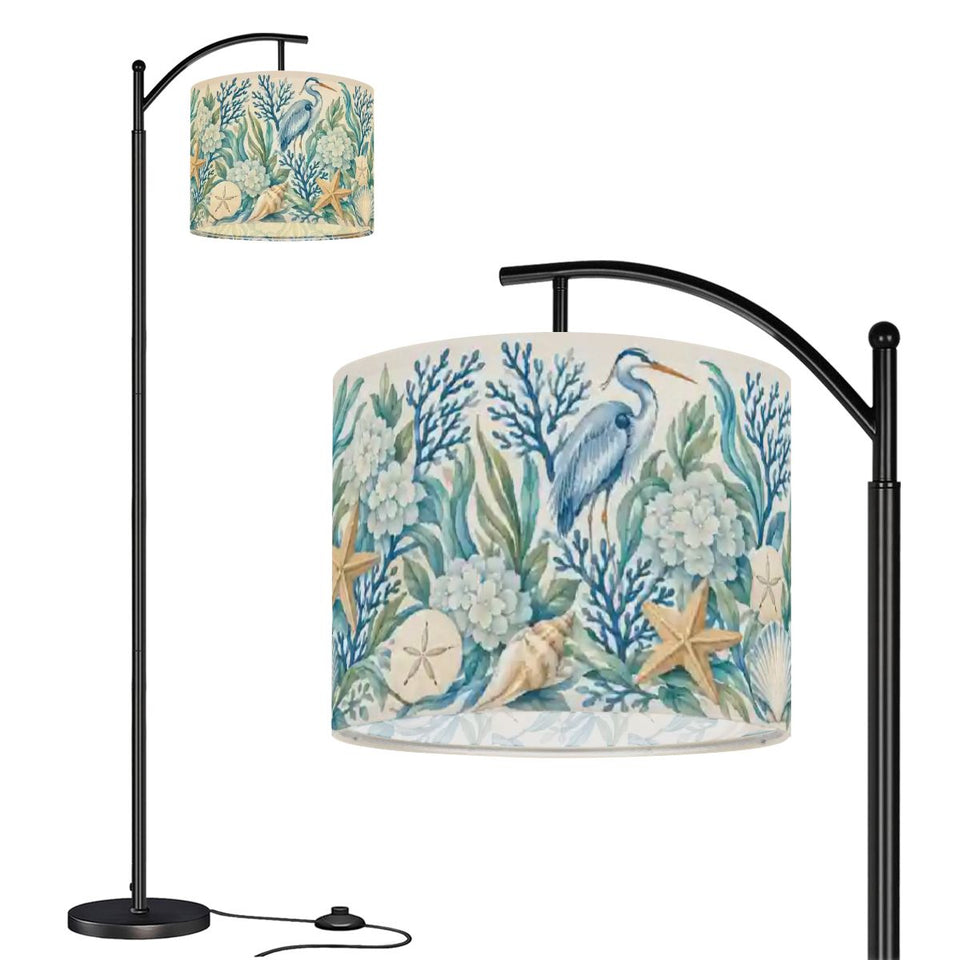 Blue coastal chinoiserie arc floor lamp with heron, coral and starfish print shade