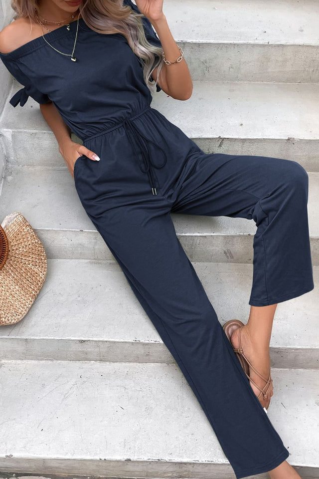 Pockets & Pizzazz: Off-Shoulder Jumpsuit with Tie Cuffs